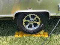 a trailer with a tire on the ground