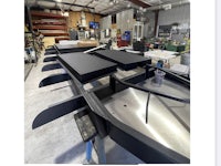 a boat is being built in a workshop