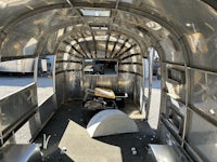 the inside of a silver airstream trailer